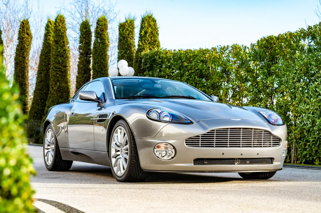 Aston martin vanquish pre production  delivery mileage  am heritage status j sy3i ys a9sxwkw3krv